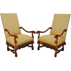 A Pair of French Louis XIV Period and Later Walnut and Upholstered Fauteuils