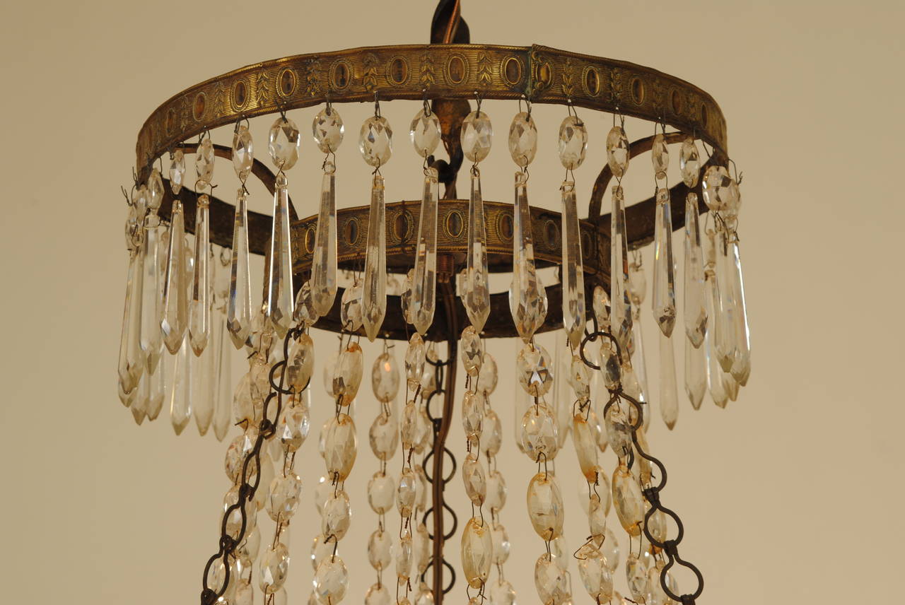 19th Century Italian Neoclassical, Stamped Brass and Glass Four-Ring 12-Light Chandelier