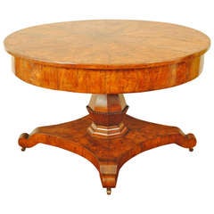 An Italian Late Neoclassical Period Walnut Veneered Center Table