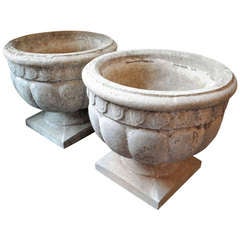 A Pair of French Neoclassical Inspired Cast Cement Garden Urns