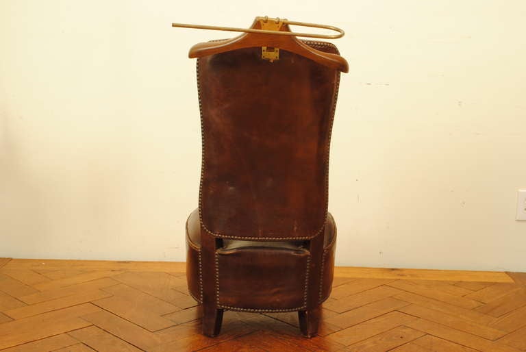 A French Louis Philippe Style Walnut and Leather Upholstered Dressing Chair