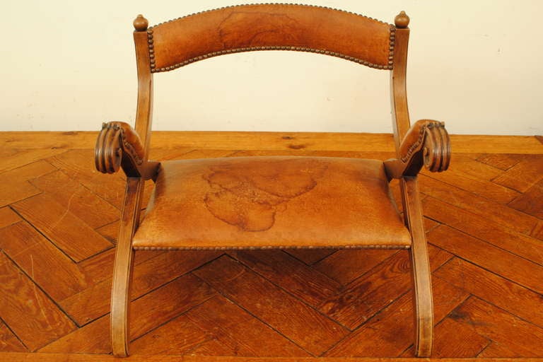 Baroque A Portuguese Low Mahogany and Leather Upholstered 
