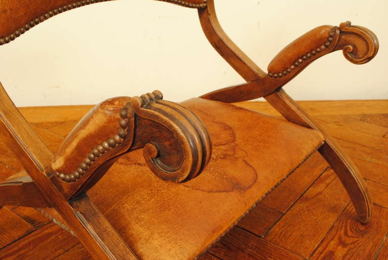 A Portuguese Low Mahogany and Leather Upholstered 