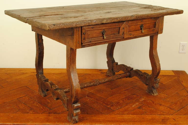 A 17th Century Portuguese Chestnut and Walnut Two Drawer Table