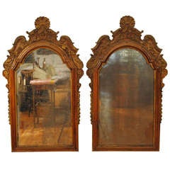 A Pair of Portuguese Mid 18th Century Walnut and Giltwood Mirrors