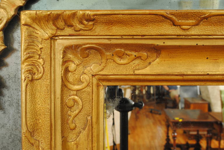 Italian Regence Period Carved Giltwood and Embossed Gilt Gesso Mirror 1