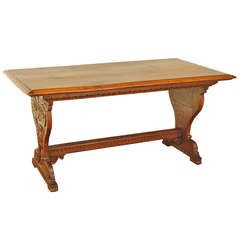 An Italian Baroque Style 18th Century and Later Walnut Trestle Table