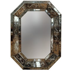 An Antique Glass Elongated Octagonal Etched and Bevelled Venetian Mirror