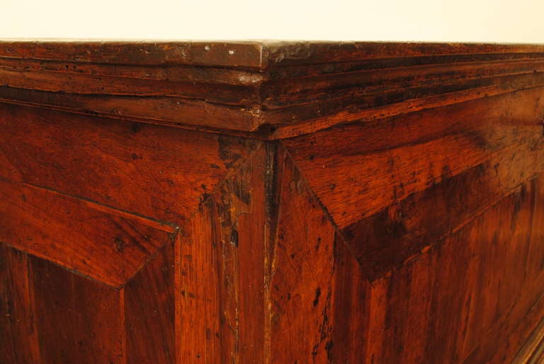 18th Century and Earlier A 17th Century Tuscan Walnut and Inlaid Cassone on Carved Feet