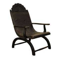 A 19th Century  Indo-Portuguese Hardwood and Leather Upholstered Armchair