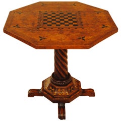 An Early 18th Century Austrian Elmwood and Inlaid Tilt Top Center or Games Table