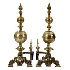 Antique A Pair of Continental Brass Flame Finial Andirons