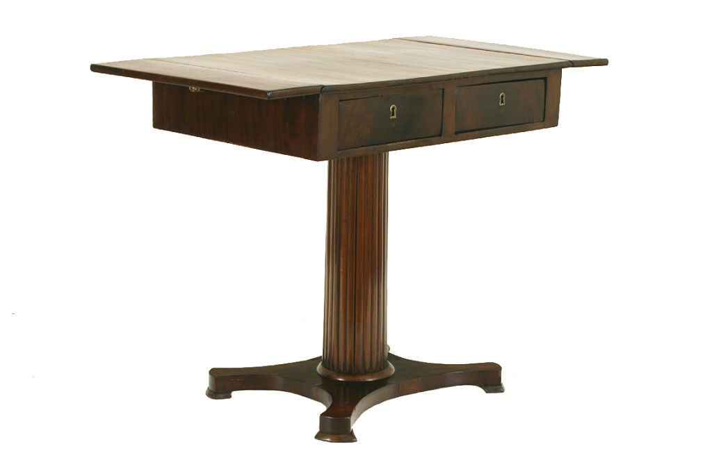 An English Regency Mahogany 2-Drawer Drop Leaf Table