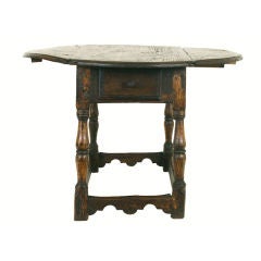 A Spanish Early 18th Century Pinewood Low Dropleaf Table