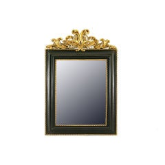 An Italian Giltwood and Ebonized 19th Cen. Baroque Style Mirror
