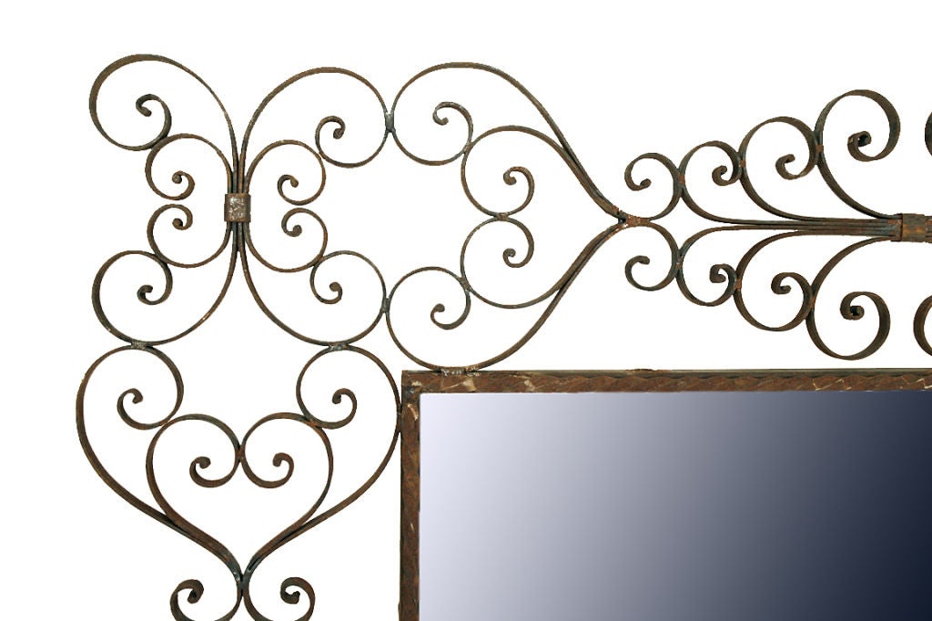 A Large Spanish Wrought Iron Mirror