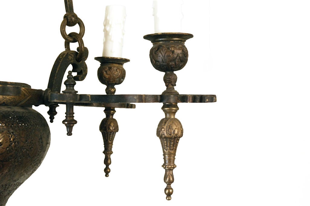 An Indian or Middle Eastern Patinated Brass 8-light Chandelier 1
