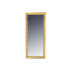 A French Late Neoclassical Tall Giltwood and Gilt Gesso Mirror