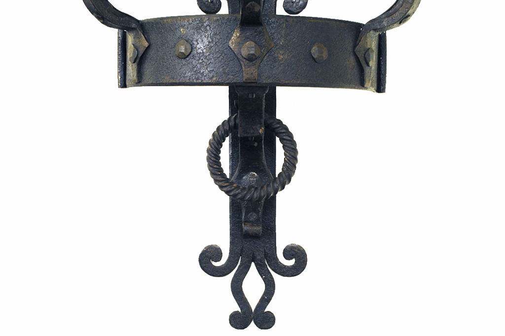 A Pair of French Wrought Iron 3-Light Wall Sconces at 1stdibs