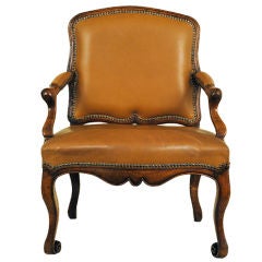A Unique French Louis XV Carved Walnut Fauteuil