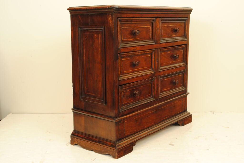 An Italian Baroque Walnut and Inlaid 3-Drawer Commode