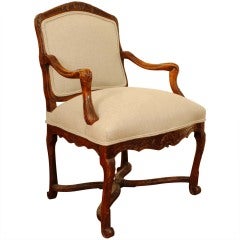 French Regence Period Carved Walnut Fauteuil