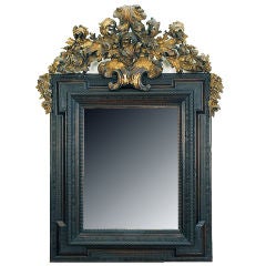 An Important Italian Baroque Carved and Giltwood Mirror