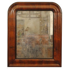 A Spanish Mid 19th Century Walnut and Ebonized Mirror