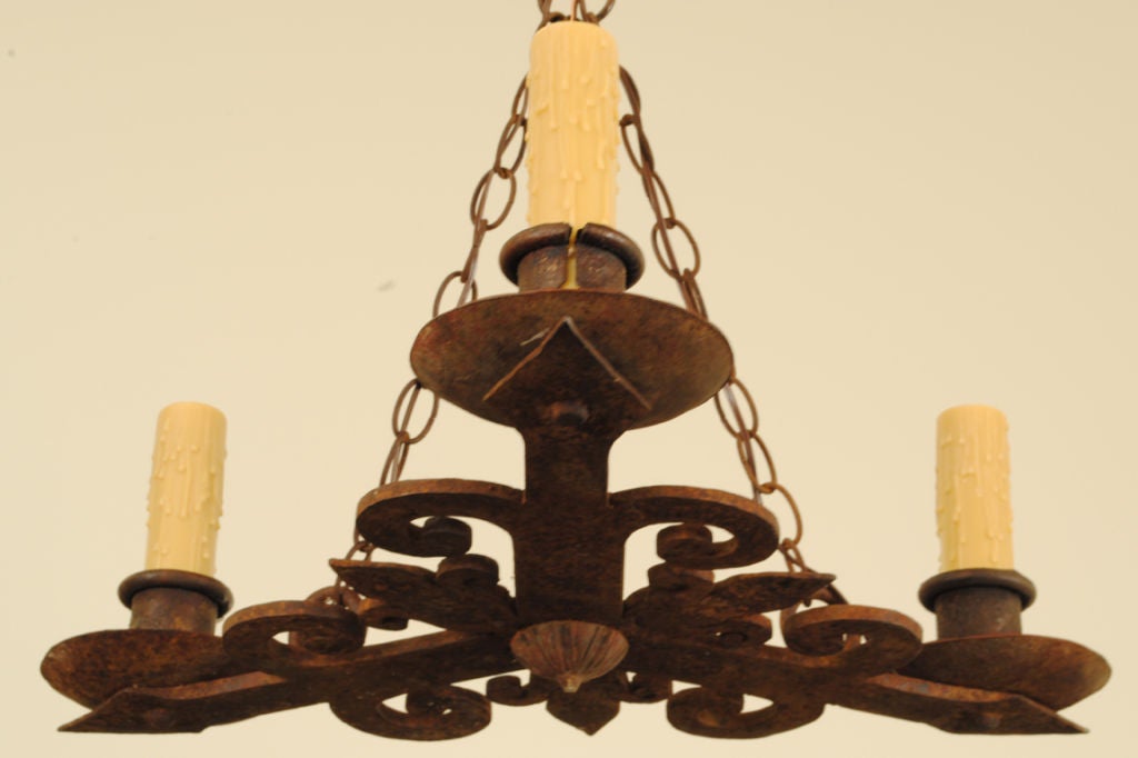 A French Baroque Style Wrought Iron 3-Arm Chandelier
