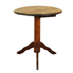 A Rustic Late Neoclassical Period Elmwood Circular Table