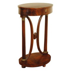 A Biedermeier Mahogany Walnut Sewing Table
