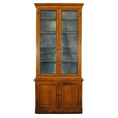 An Italian Necolassical Period Painted Two-Piece Cabinet