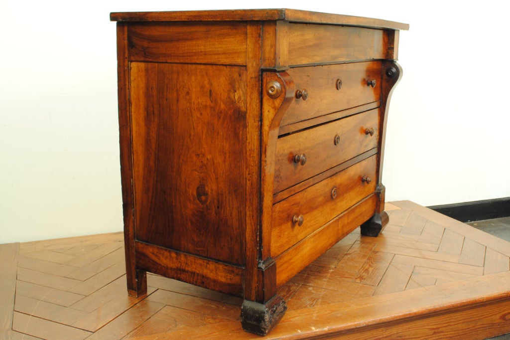 A Bold Louis Philippe Walnut 4-Drawer Commode
