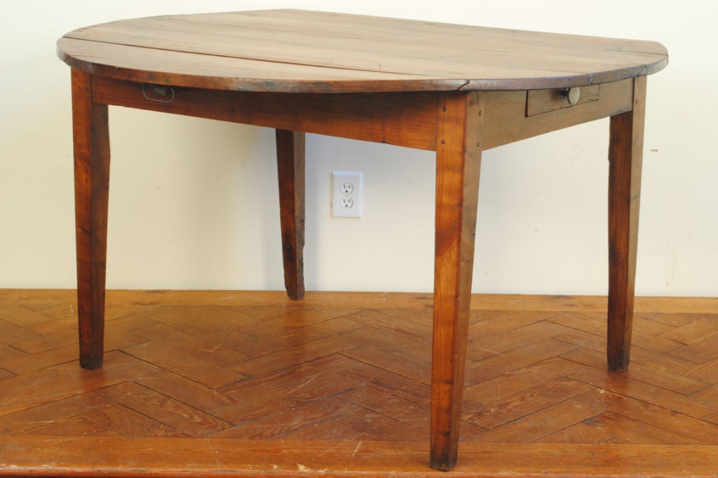 A French Neoclassical Cherrywood Drop-Leaf Breakfast Table