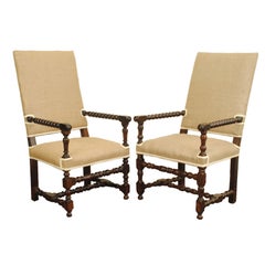 A Pair of 19th Century Louis XIII Style Walnut Fauteuils