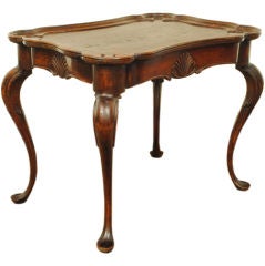 A Continental 19th Century Mahogany Queen Anne Style Table