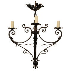 An Italian Baroque Style Wrought Iron 4-Light Chandelier