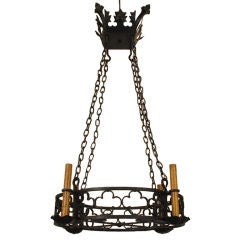 A Substantial French Baroque Style Wrought Iron Chandelier