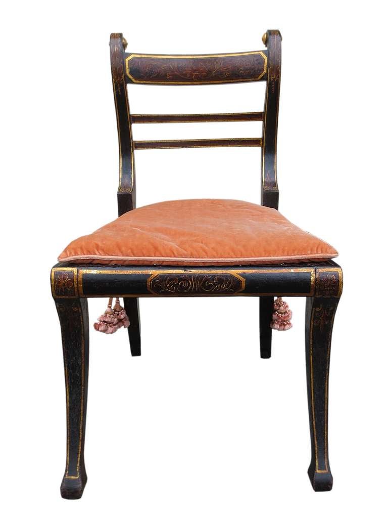 Pair of 18th century English Regency chairs.  Circa 1820.  Incredible paint detail.

Seat: 17