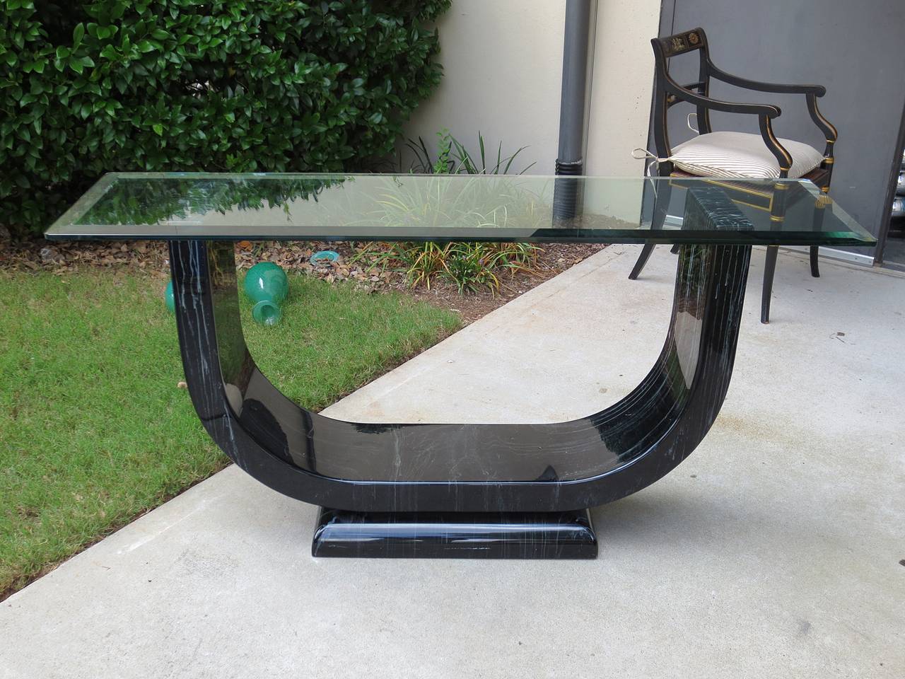 Mid-20th century faux marble console in the style of Karl Springer, glass top
Mid-20th century Italian faux marble console with glass top, attributed to Karl Springer
with label 'Made in Italy'
Glass has a beveled edge
The console's material is