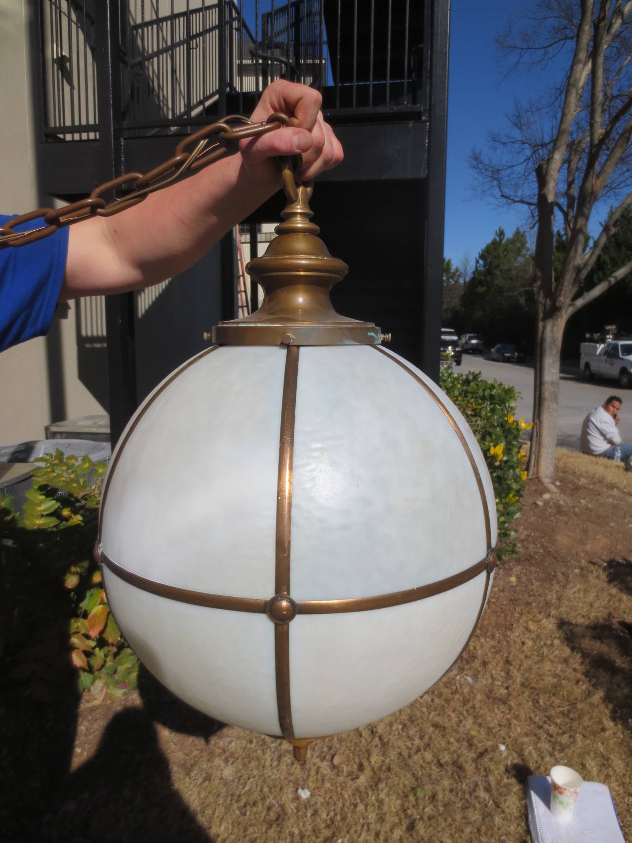 Early 20th century large globe form hanging light fixture.