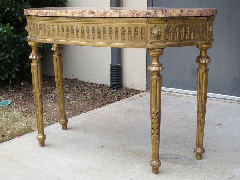 18th/19th Century Continental Carved Giltwood Demilune Console, Breche Marble Top, Fluted leg
Beautiful carving, incredible quality