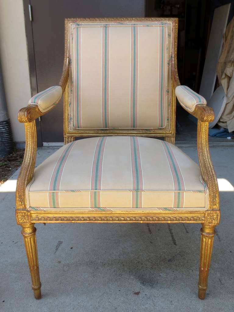 Pair of 19th Century Louis XVI style giltwood fauteuils.