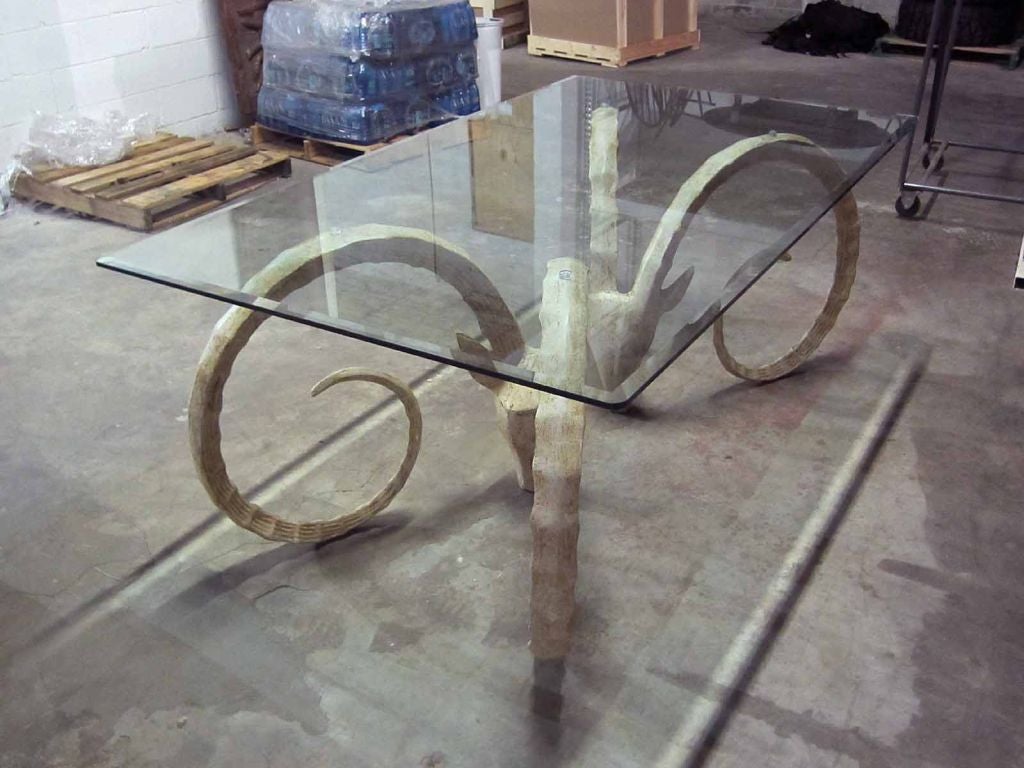 MID C IRON ANTELOPE TABLE WITH GLASS TOP<br />
AN ATLANTA RESOURCE FOR FINE ANTIQUES<br />
WE HAVE A VERY LARGE INVENTORY ON OUR WEBSITE<br />
TO VISIT GO TO WWW.PARCMONCEAU.COM