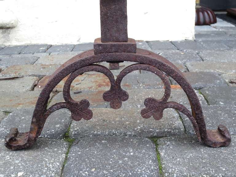 European Pair of Large Continental Iron and Bronze Andirons with Faces on Finial For Sale