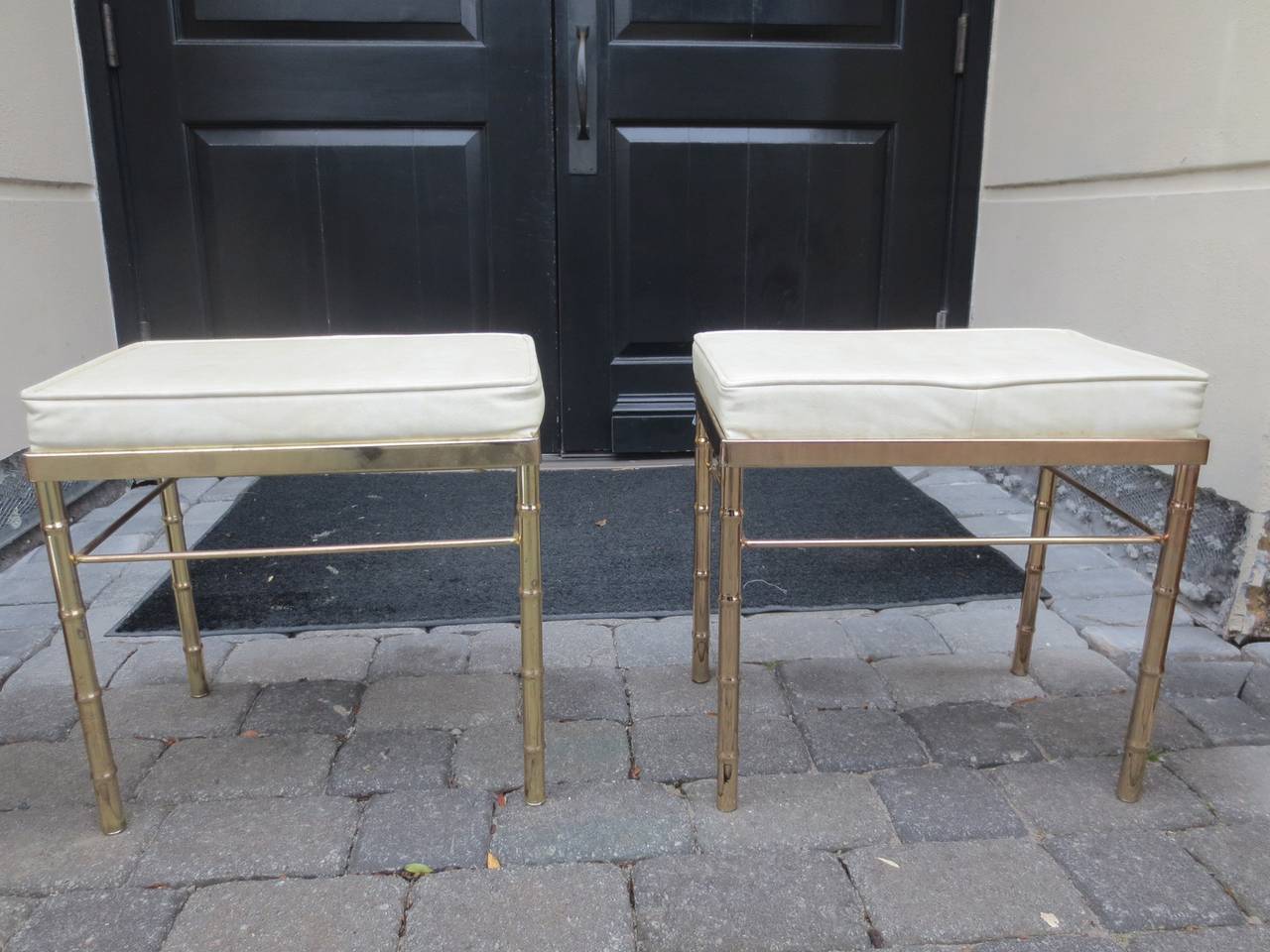 Pair of Midcentury brass benches.