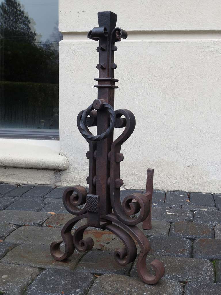 Pair of Renaissance Revival wrought iron andirons.