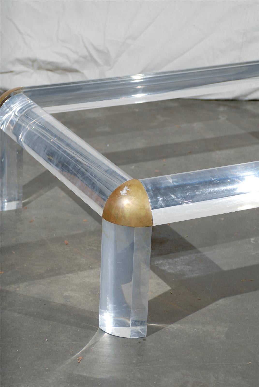 Circa 1970s Lucite, Brass, Glass Coffee Table Attributed to Maison Jansen In Good Condition In Atlanta, GA