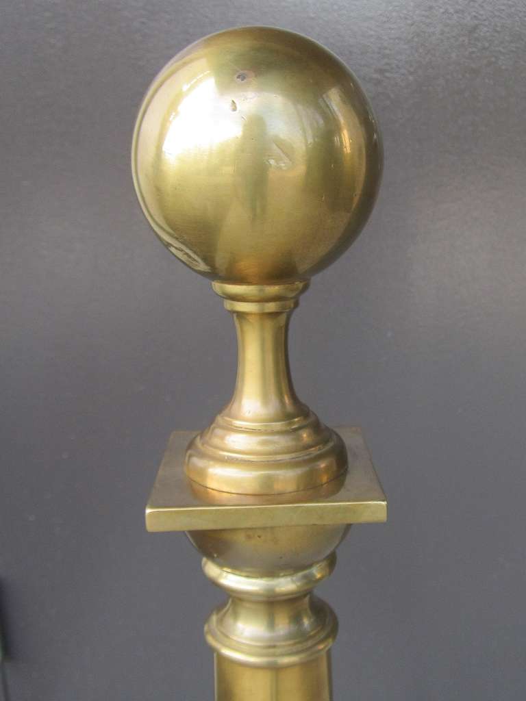 Pair of early 20th century brass andirons ball finial.