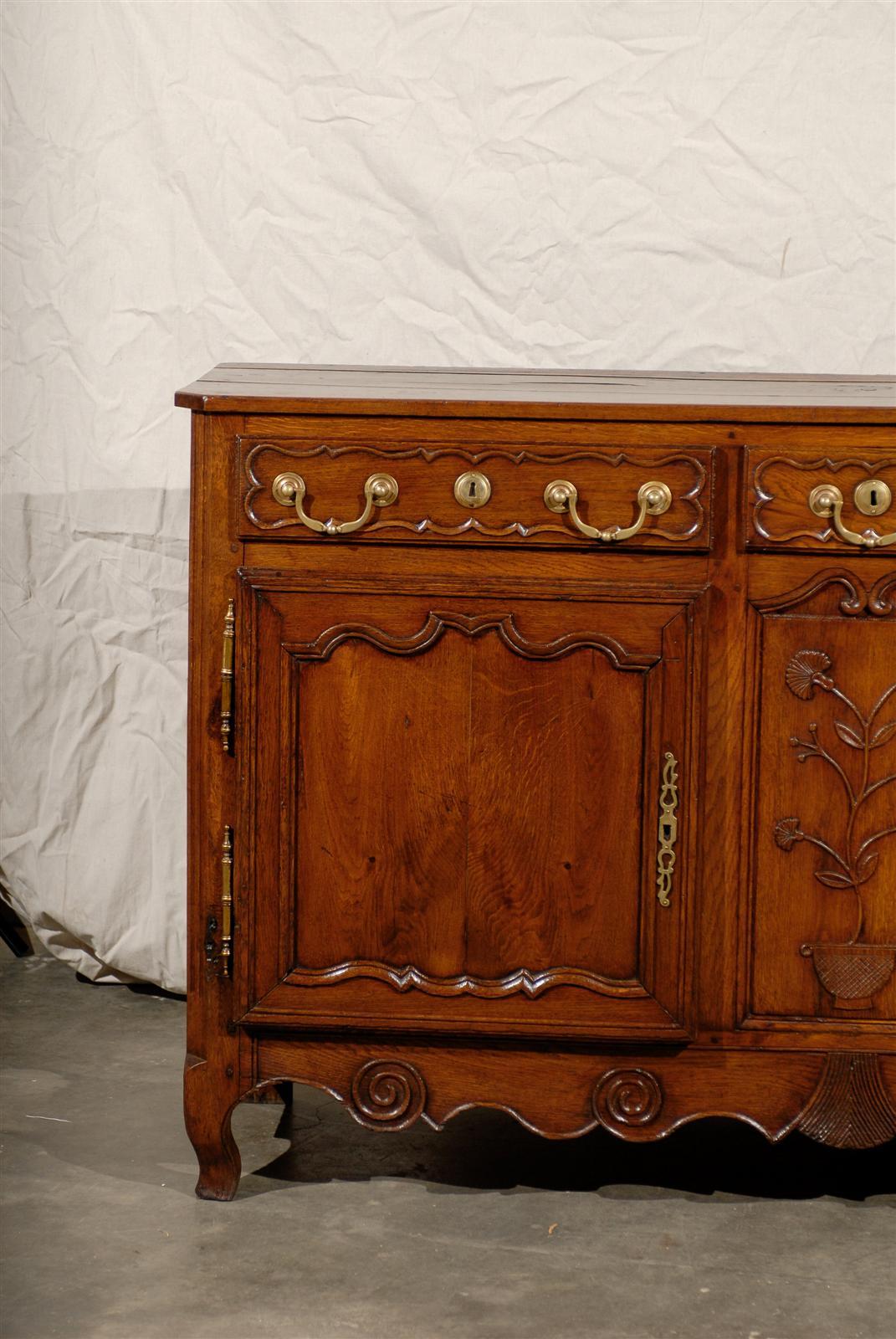 19th century Louis XV Style French Buffet with two Doors and three drawers, fruitwood, great detail.